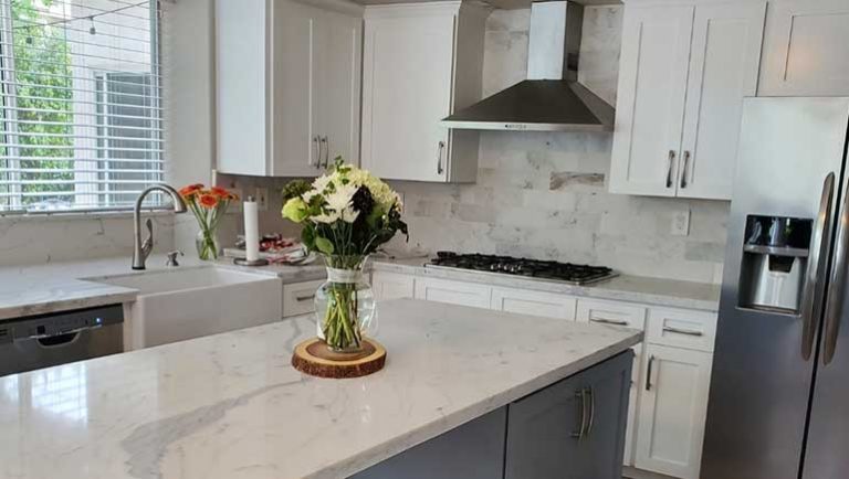 Modern kitchen remodel with custom cabinets and quartz countertops